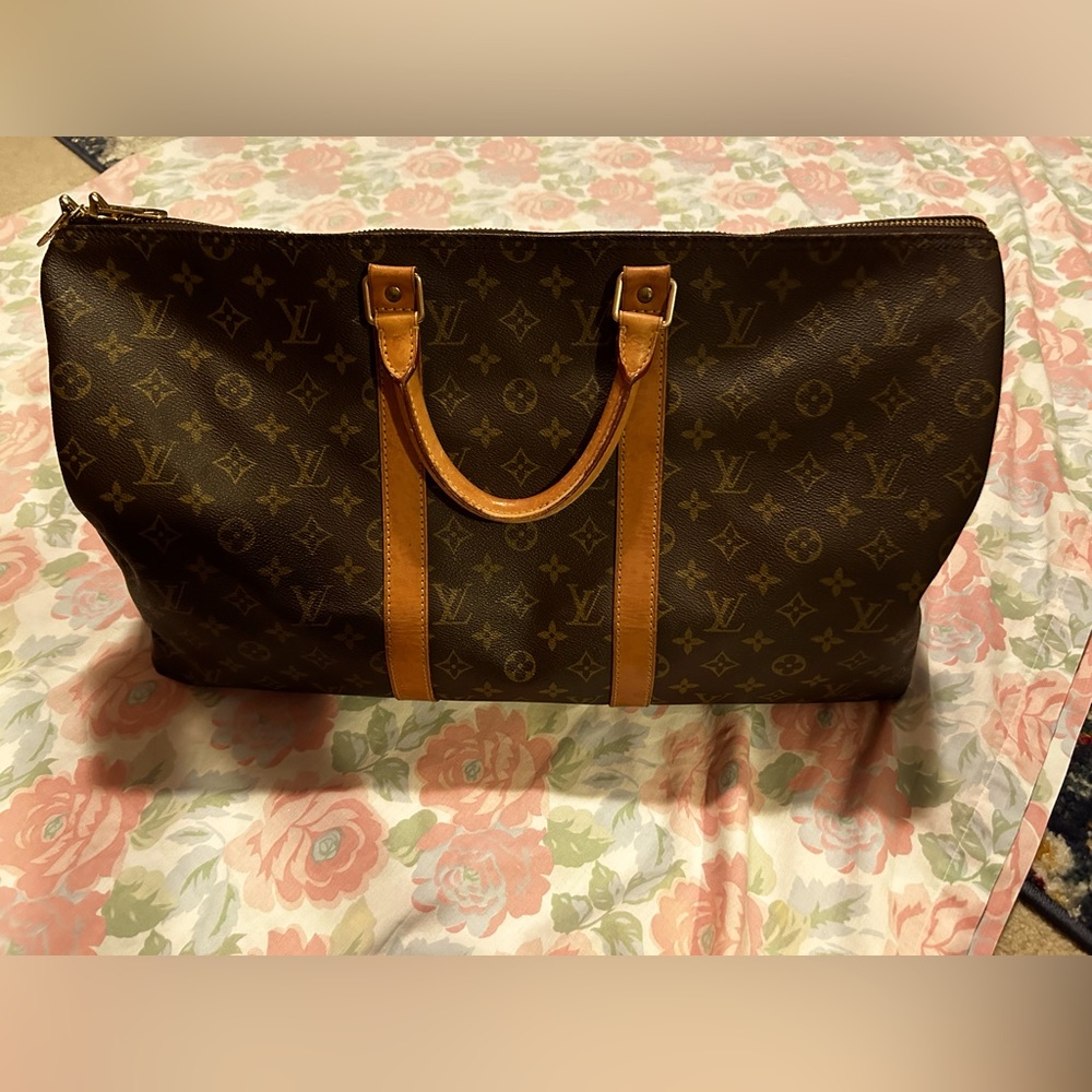 Authentic Louis Vuitton Keepall 55 travel bag